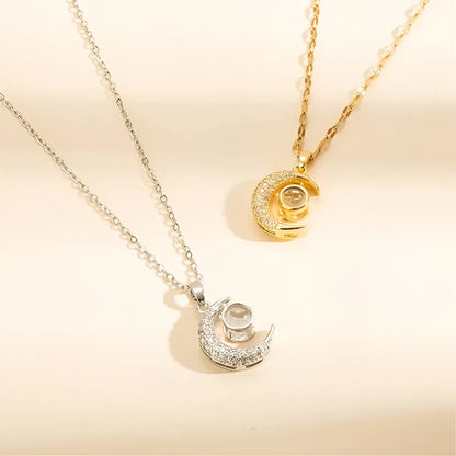 COLLAR LUNA PROYECTA FRASE TE AMO EN 100 IDIOMAS